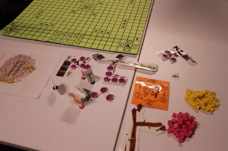 Game pieces and board spread out on a table